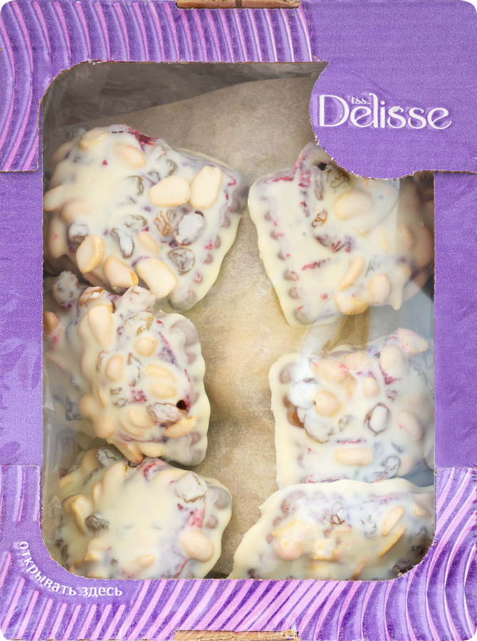 Десерт DELISSE со вкусом клюквы с изюмом и арахисом, в белой глазури, 700г